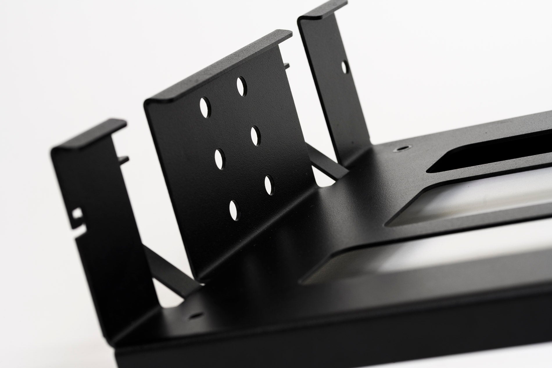 Detalle del soporte de pared para bicis, parte de los ganchos